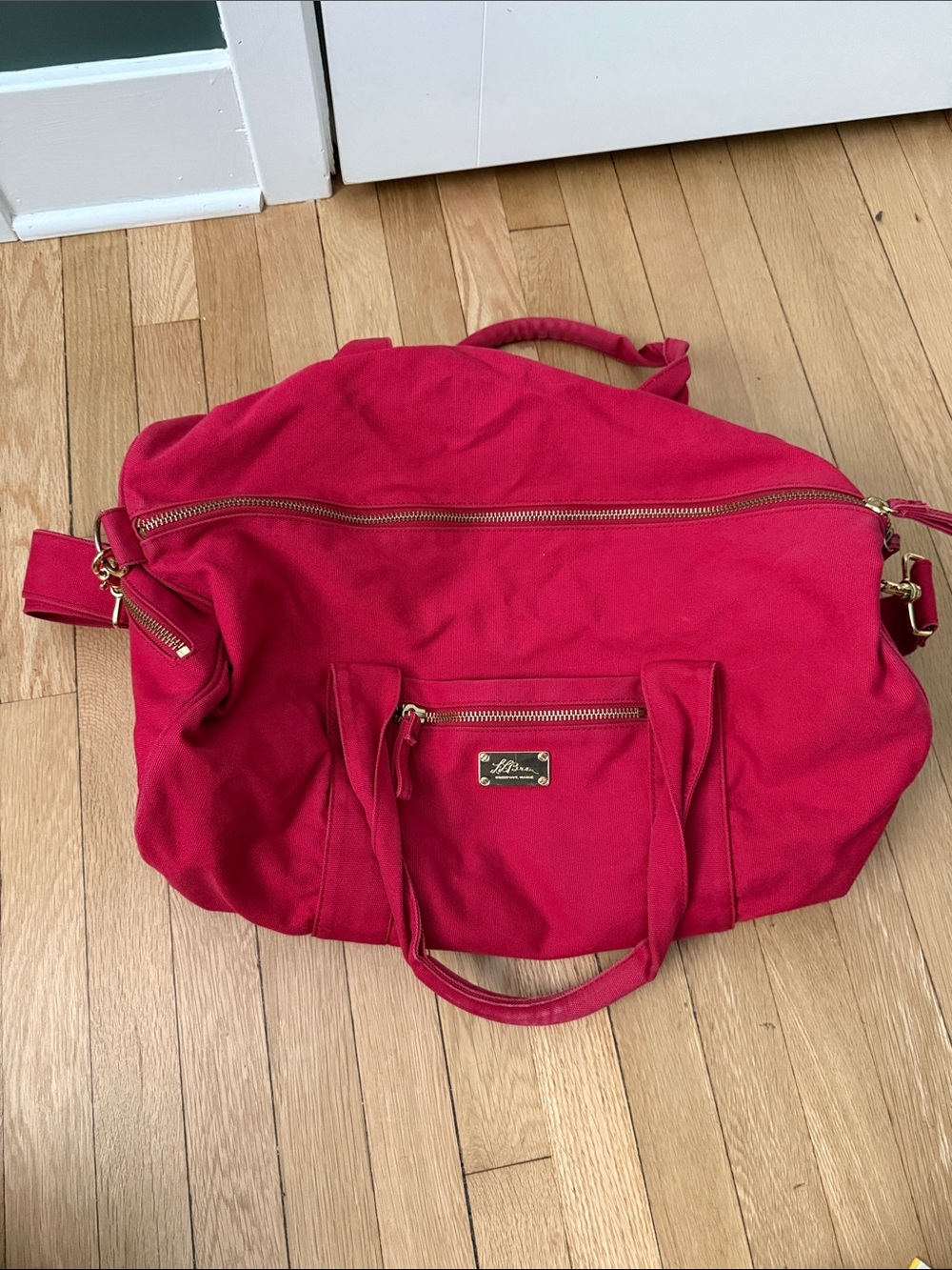 L.L. Bean Red Duffel Bag with Gold Hardware